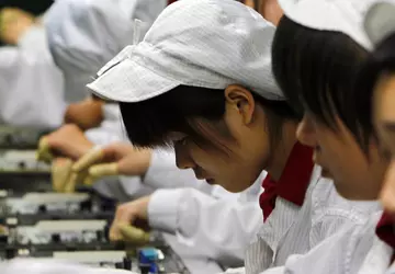 Foxconn oskarżył, że firma wykorzystuje pracę ...