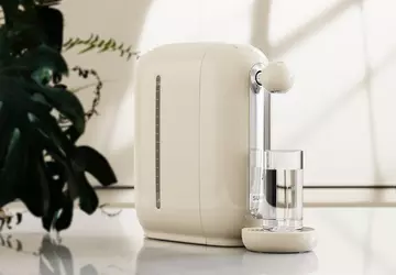 Ten elegancki domowy dystrybutor wody przeznaczony ...