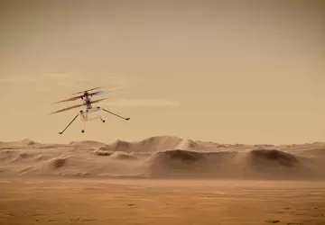 Marsjański dron Ingenuity wspina się na ...