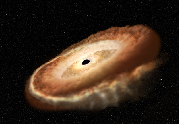 Supermasywna czarna dziura niszczy gwiazdę i ...