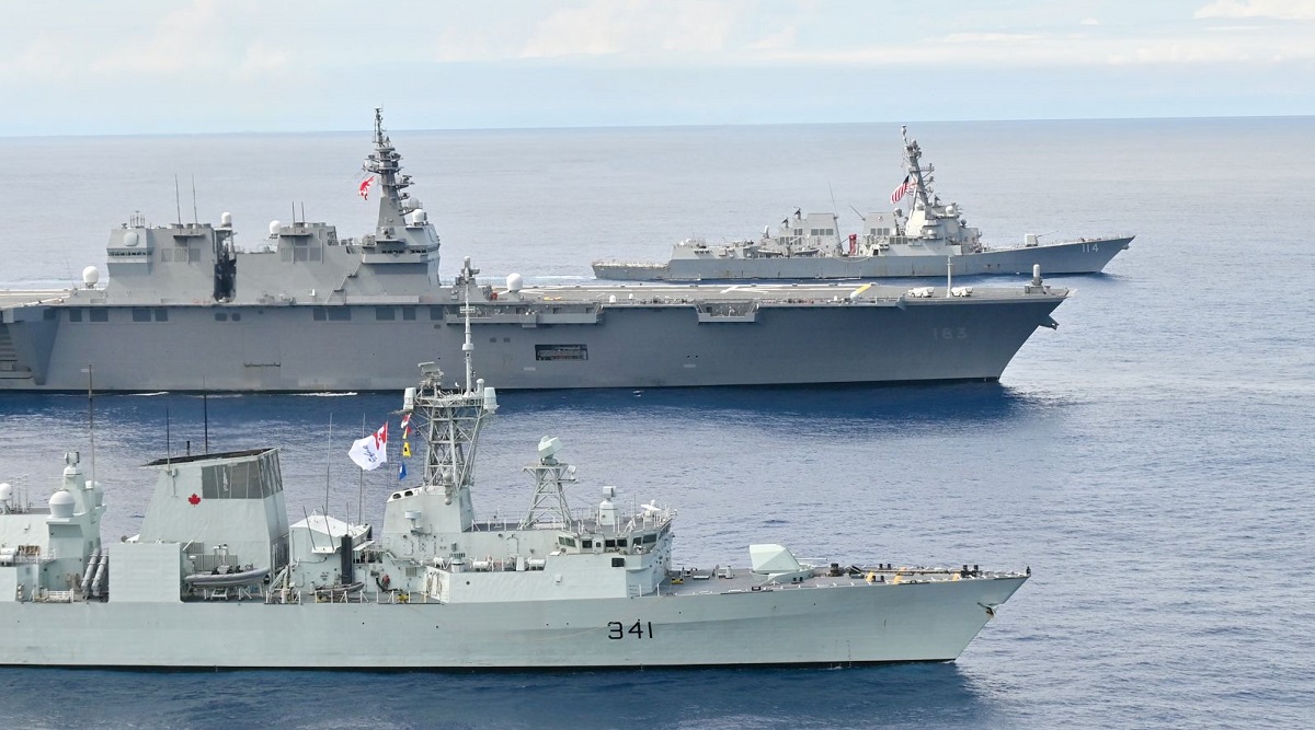 USS Ralph Johnson i HMCS Ottawa przepłynęły przez Cieśninę Tajwańską pod nadzorem chińskiego niszczyciela rakietowego CNS Hohhot.